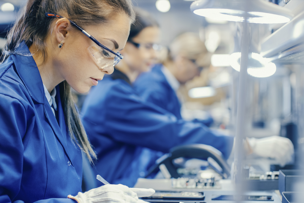 Quality control Woman inspecting parts Quality control Woman inspecting parts